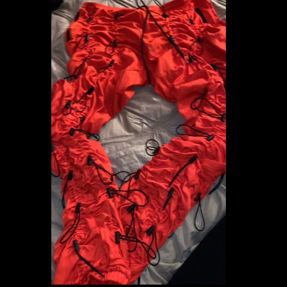 RED BUNGEE CORD PANTS